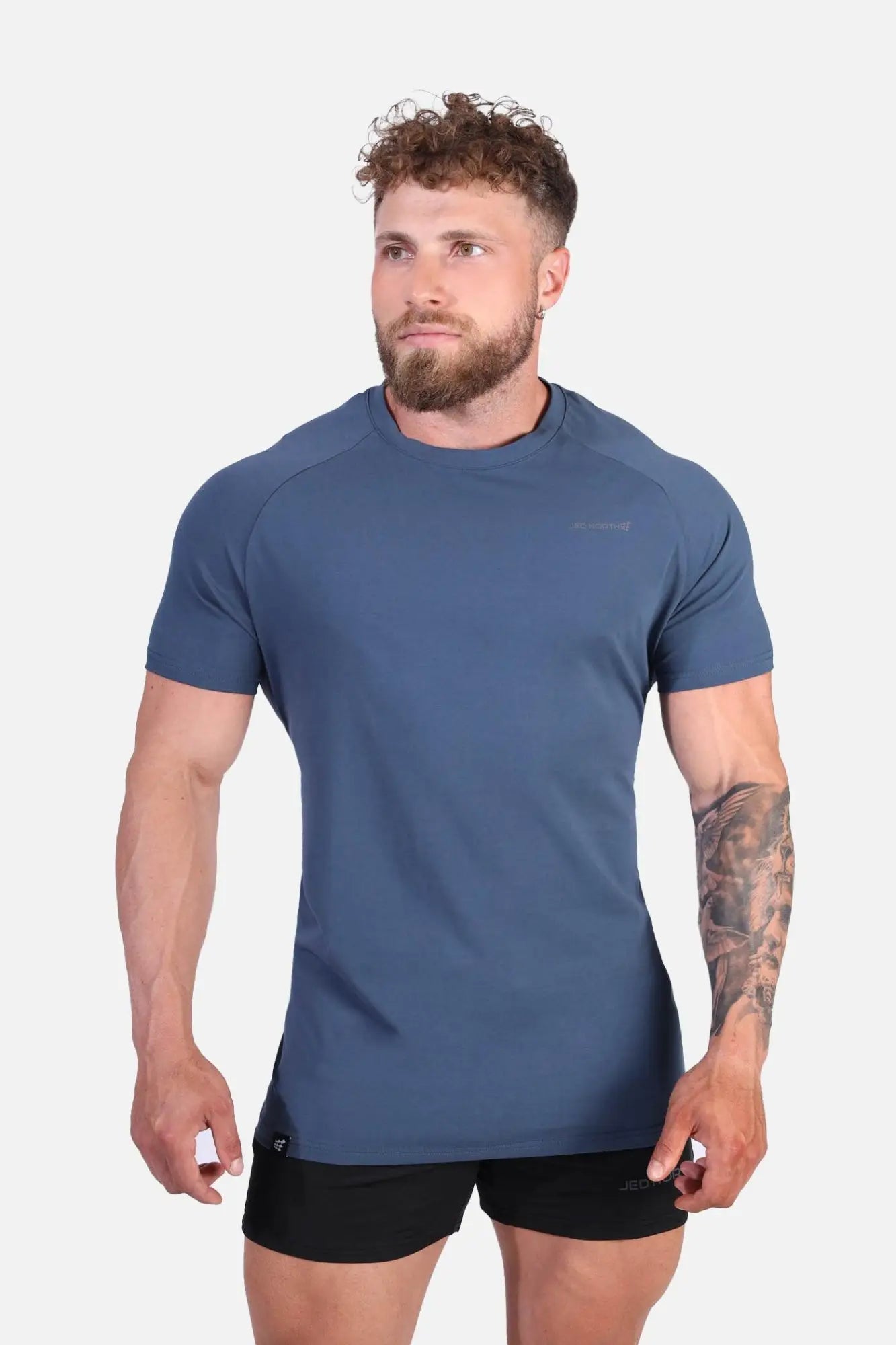 Jed North Titan 2.0 muscle-fit t-shirt in dark teal with raglan sleeves and subtle chest logo for athletic use