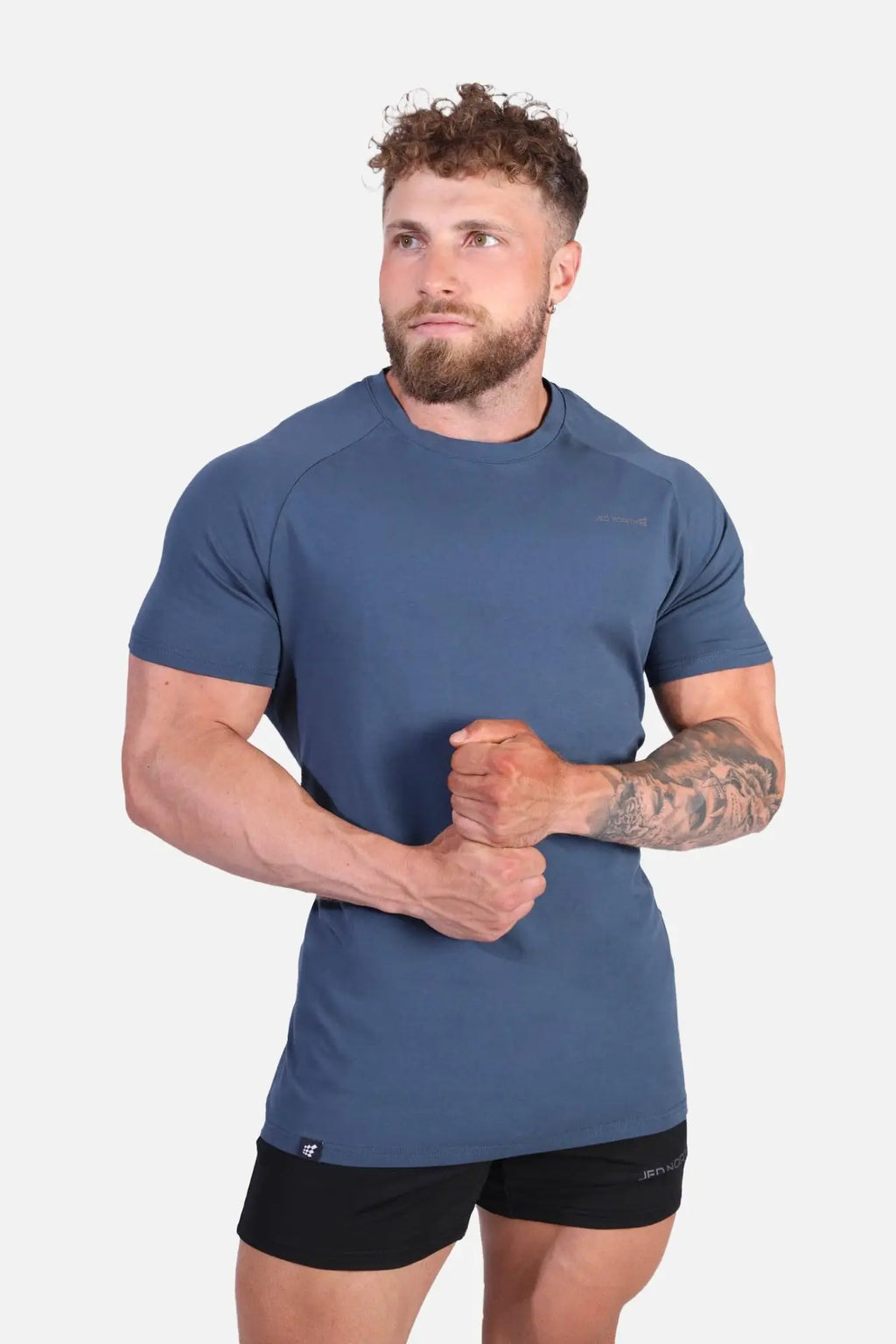 Jed North Titan 2.0 muscle-fit t-shirt in dark teal navy blue with short sleeves and subtle chest branding