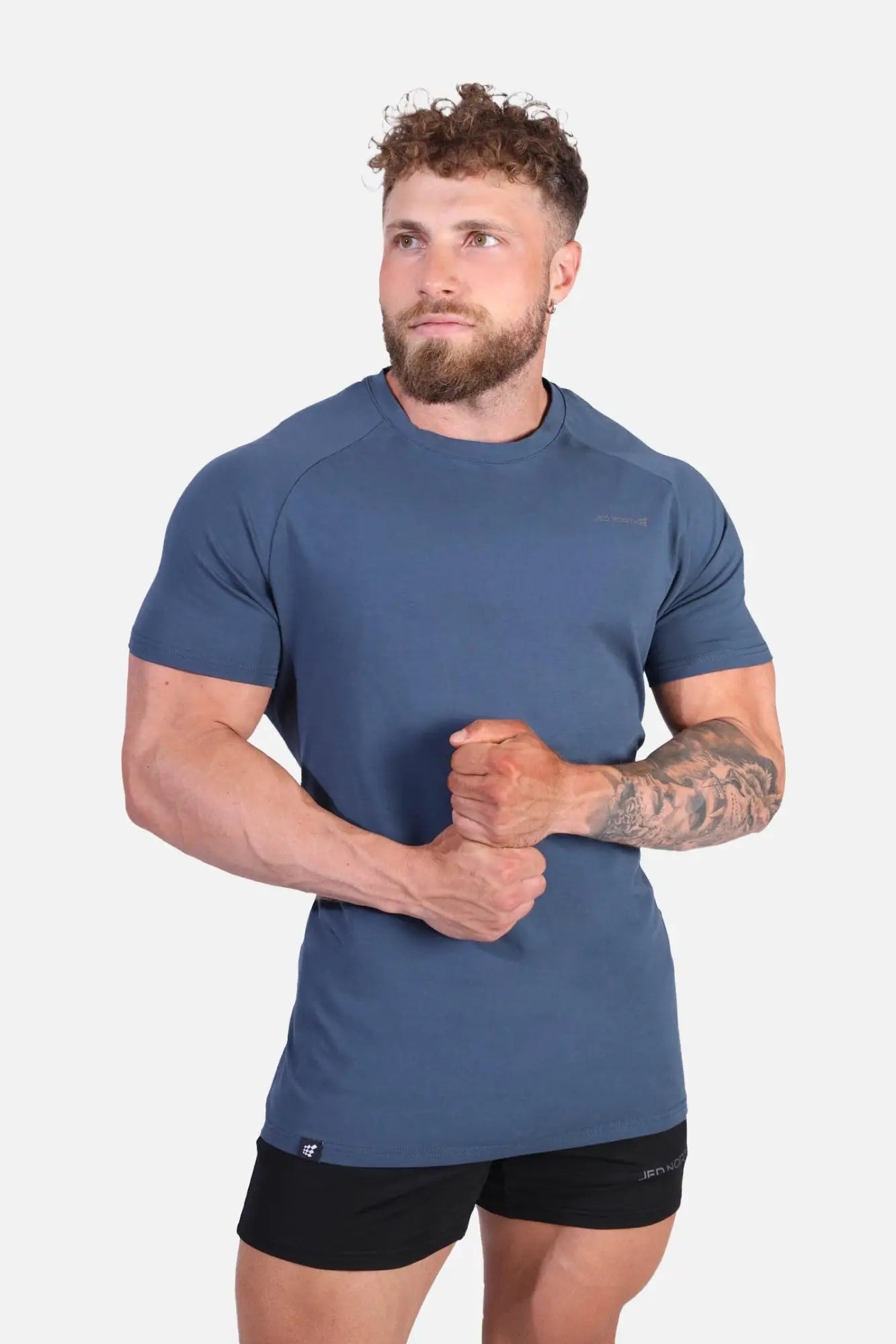 Jed North Titan 2.0 muscle-fit t-shirt in dark teal navy blue with short sleeves and subtle chest branding