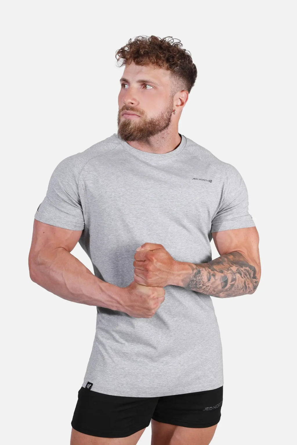 Gray heathered jed north titan 2.0 muscle-fit t-shirt with short sleeves and subtle chest logo