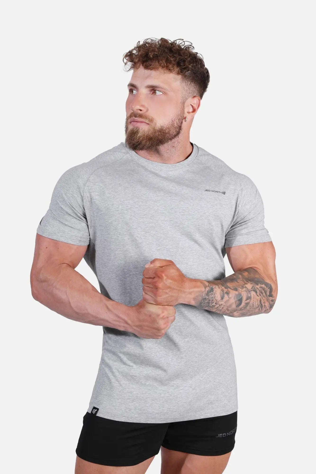 Gray heathered jed north titan 2.0 muscle-fit t-shirt with short sleeves and subtle chest logo