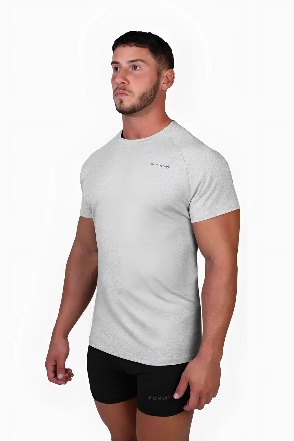 Heather gray short-sleeved muscle-fit fitness tee by Jed North with subtle chest logo for active wear