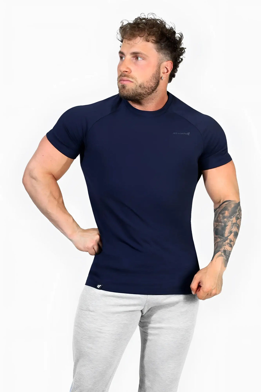 Navy blue short-sleeved muscle-fit athletic t-shirt with crew neck and subtle chest logo by Jed North Titan 2.0