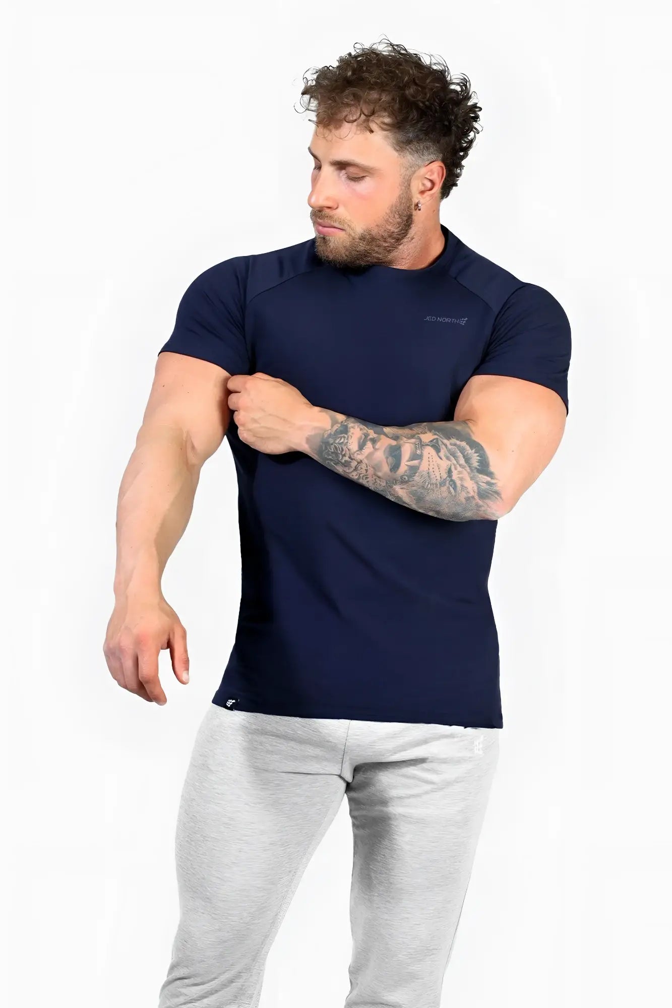 Jed North Titan 2.0 navy blue muscle-fit short-sleeved athletic t-shirt with subtle chest logo and bottom hem tag