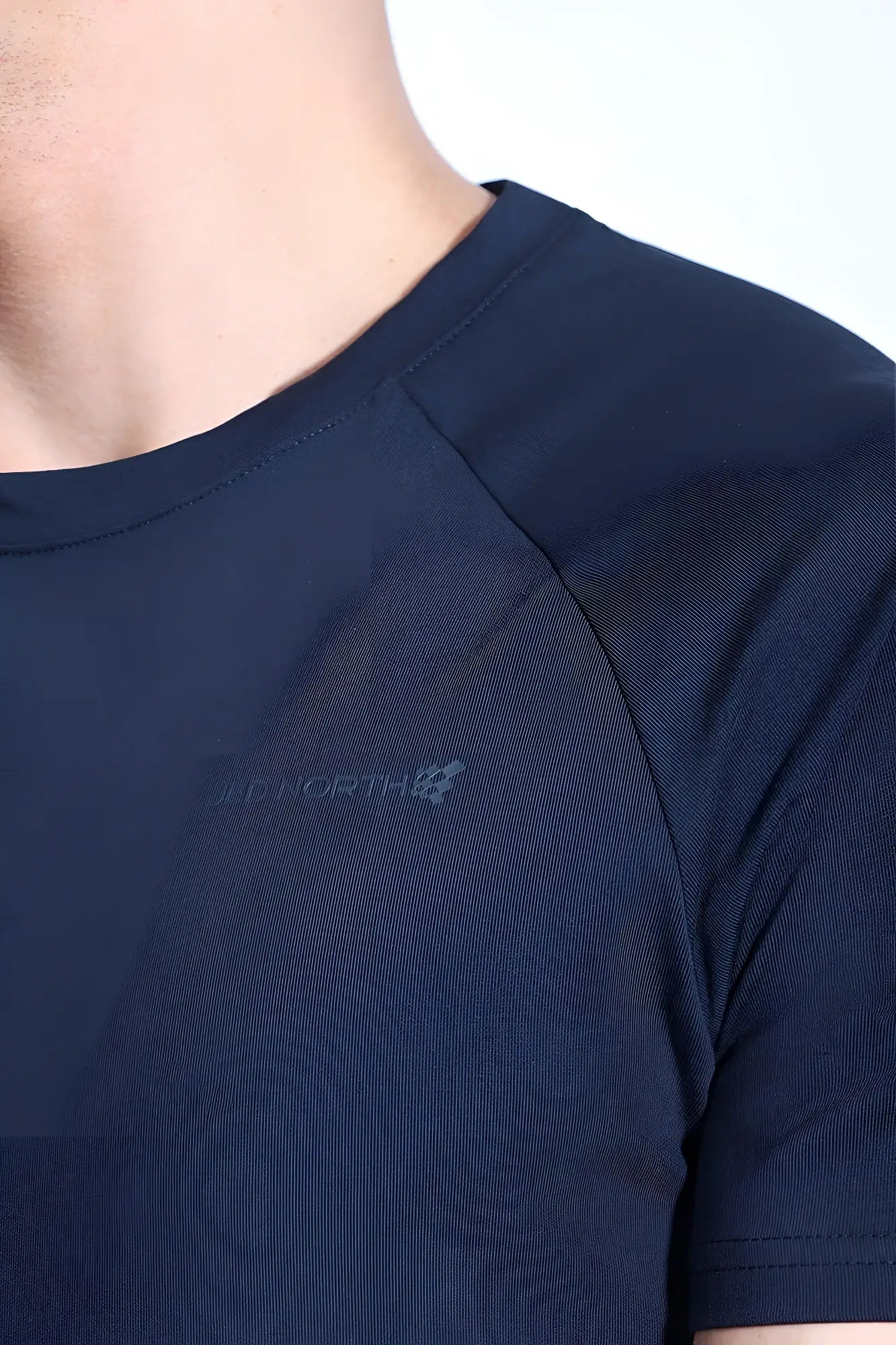Jed North Titan 2.0 muscle-fit navy athletic t-shirt with ribbed texture and jef north logo embroidered on chest