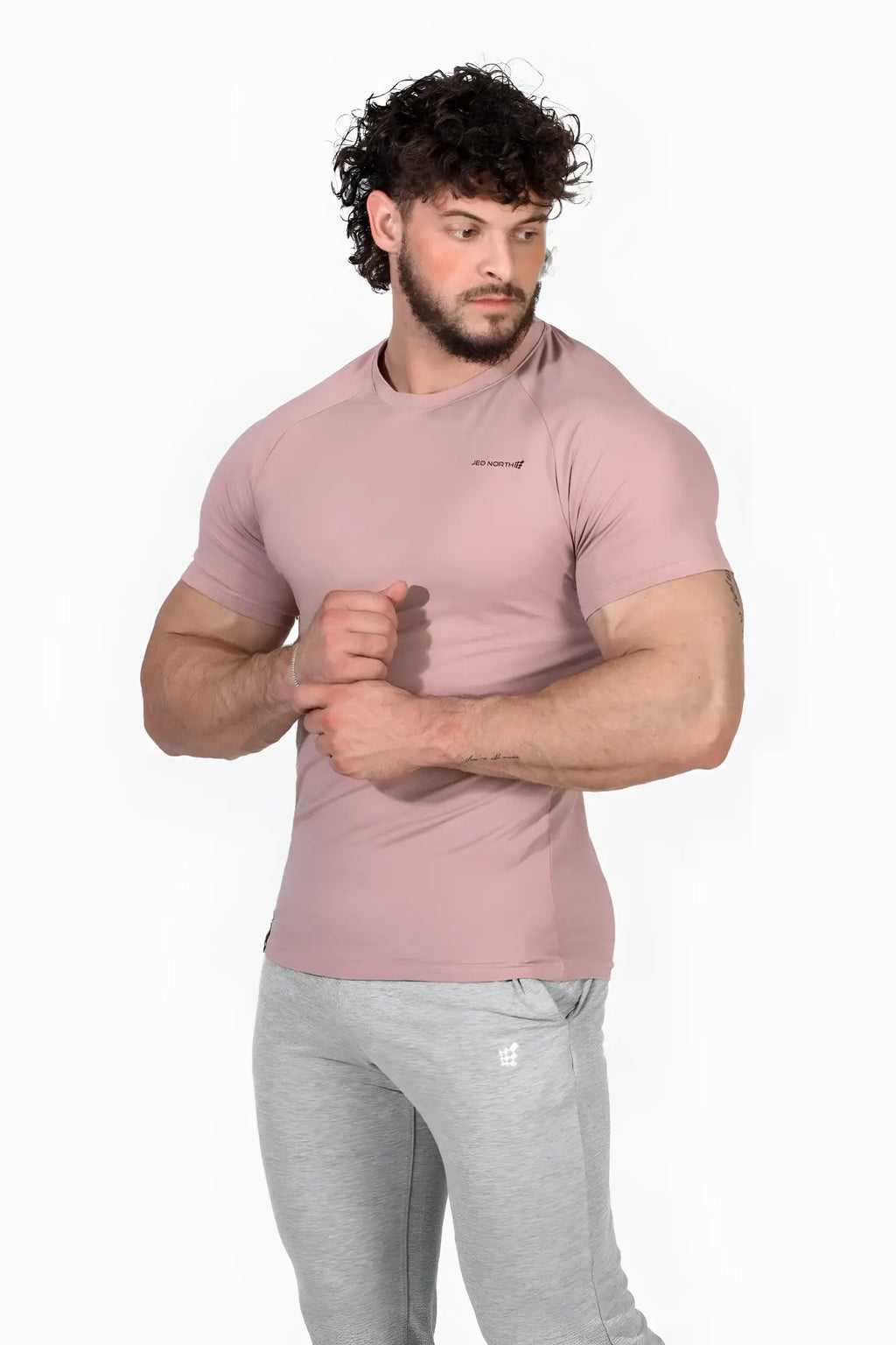 Jed North Titan 2.0 muscle-fit t-shirt in salmon pink featuring short sleeves and a subtle chest logo for athletic wear