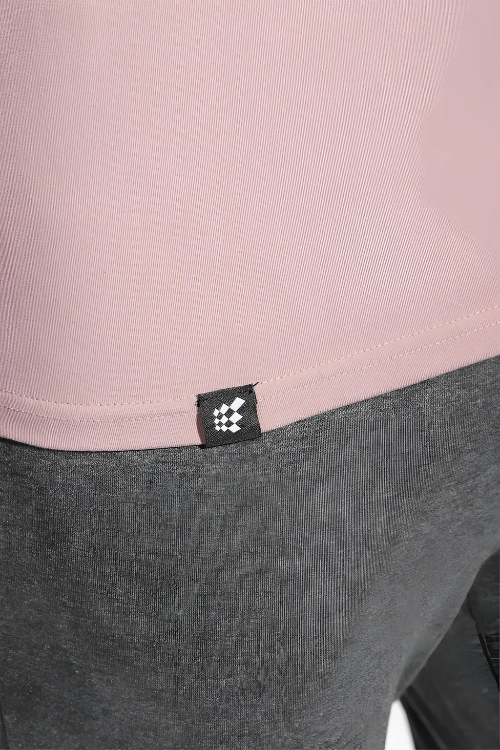 Jed North Titan 2.0 muscle-fit t-shirt salmon pink ribbed knit with black and white checkered brand tag at hem