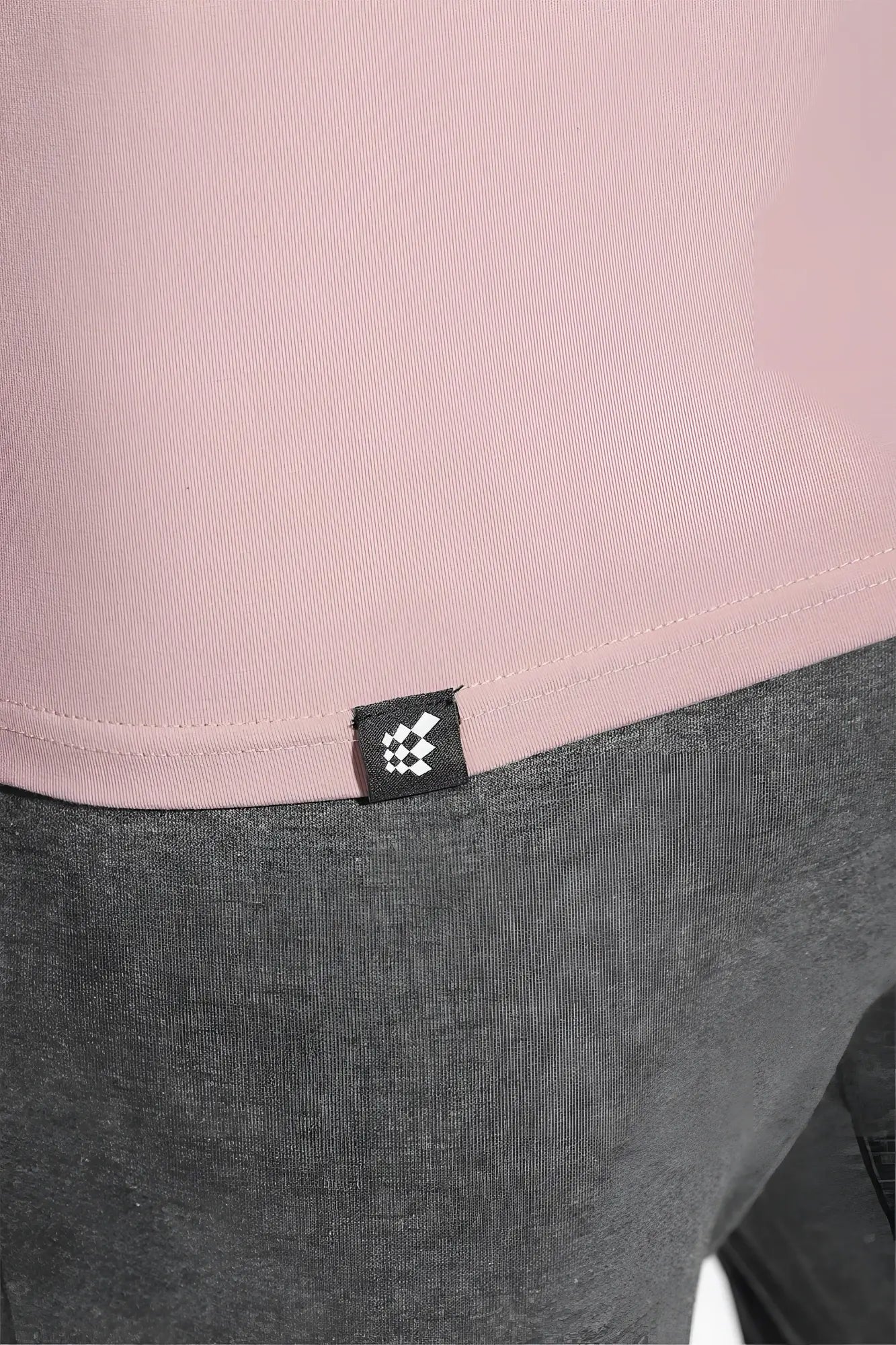 Jed North Titan 2.0 muscle-fit t-shirt salmon pink ribbed knit with black and white checkered brand tag at hem