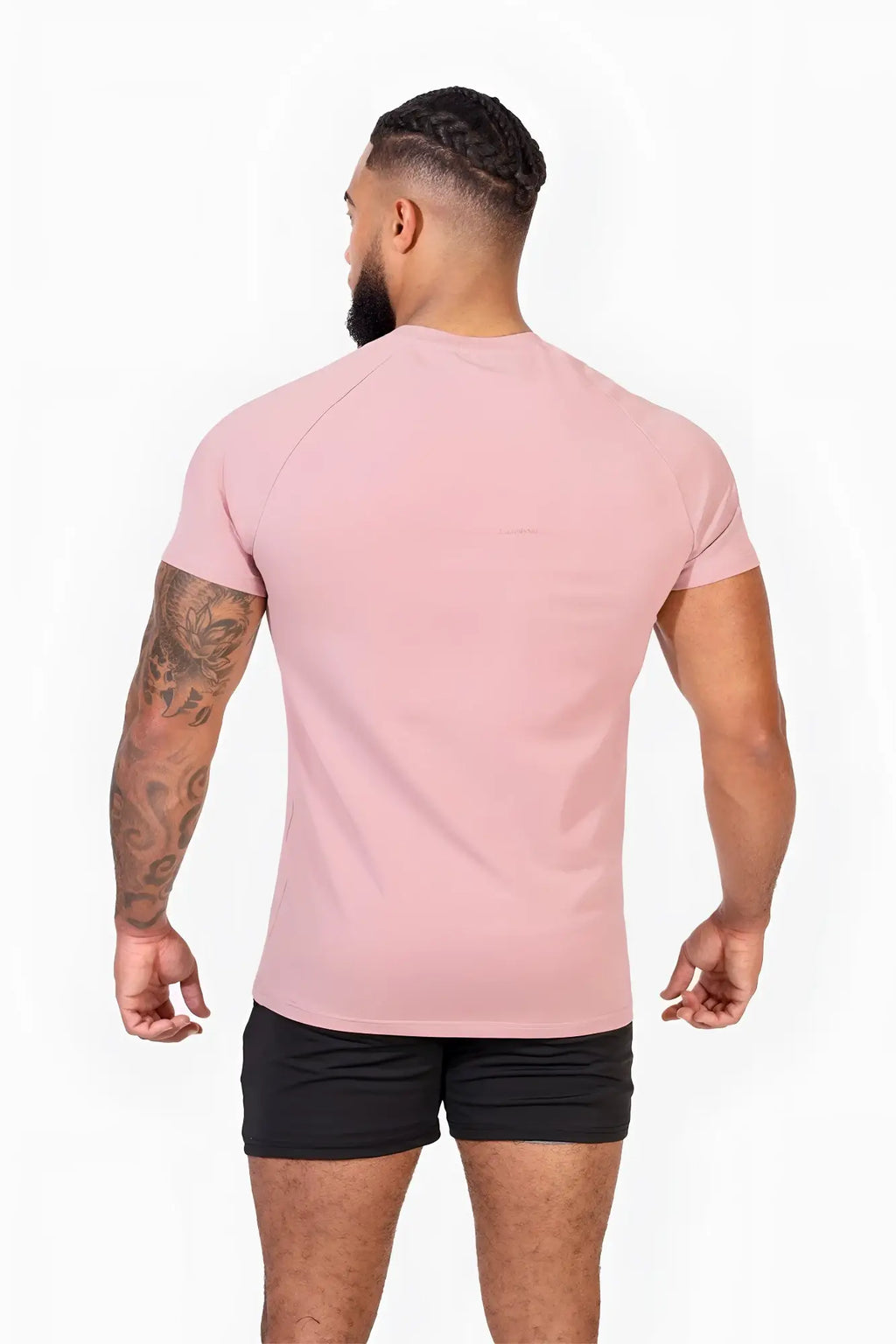 A sleek light pink Jed North Titan 2.0 muscle-fit t-shirt with short raglan sleeves and classic crew neck