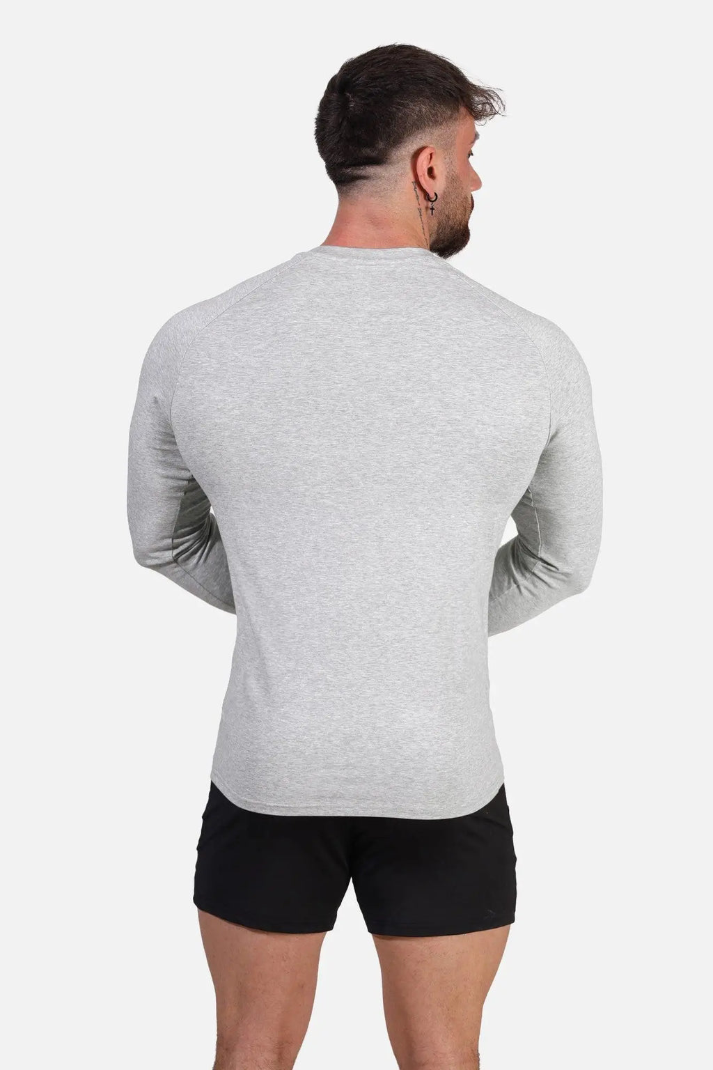 A heather gray jed north titan muscle-fit long sleeve athletic shirt with crew neck and fitted cut in platinum color