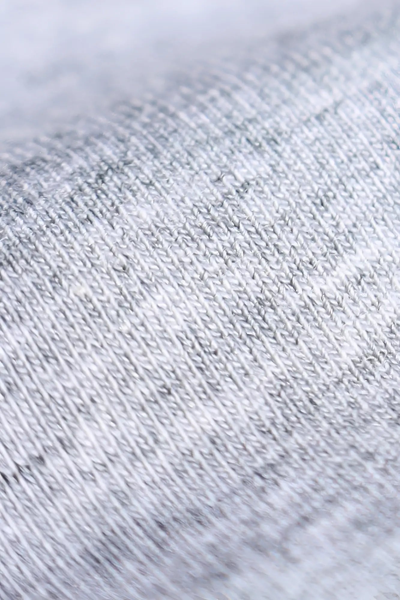 A jed north titan muscle-fit long sleeve t-shirt in platinum heather gray soft knit fabric with subtle texture