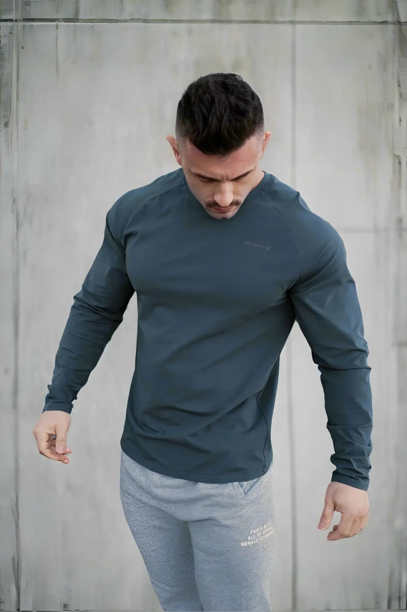 Jed North Titan muscle-fit long sleeve t-shirt in steel blue with subtle brand logo for athletic use