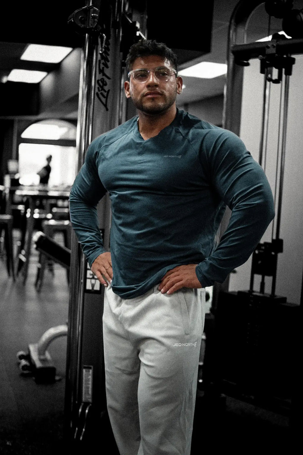 Jed North Titan muscle-fit long sleeve athletic shirt in steel blue with v-neck and subtle chest logo