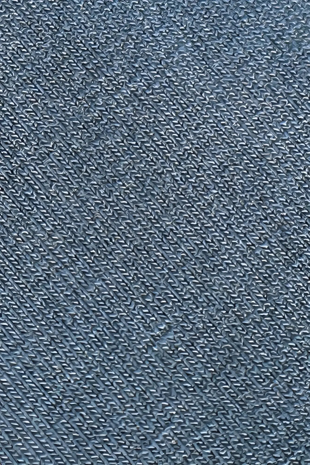 Blue denim fabric with diagonal weave on jed north titan muscle-fit long sleeve t-shirt in steel blue