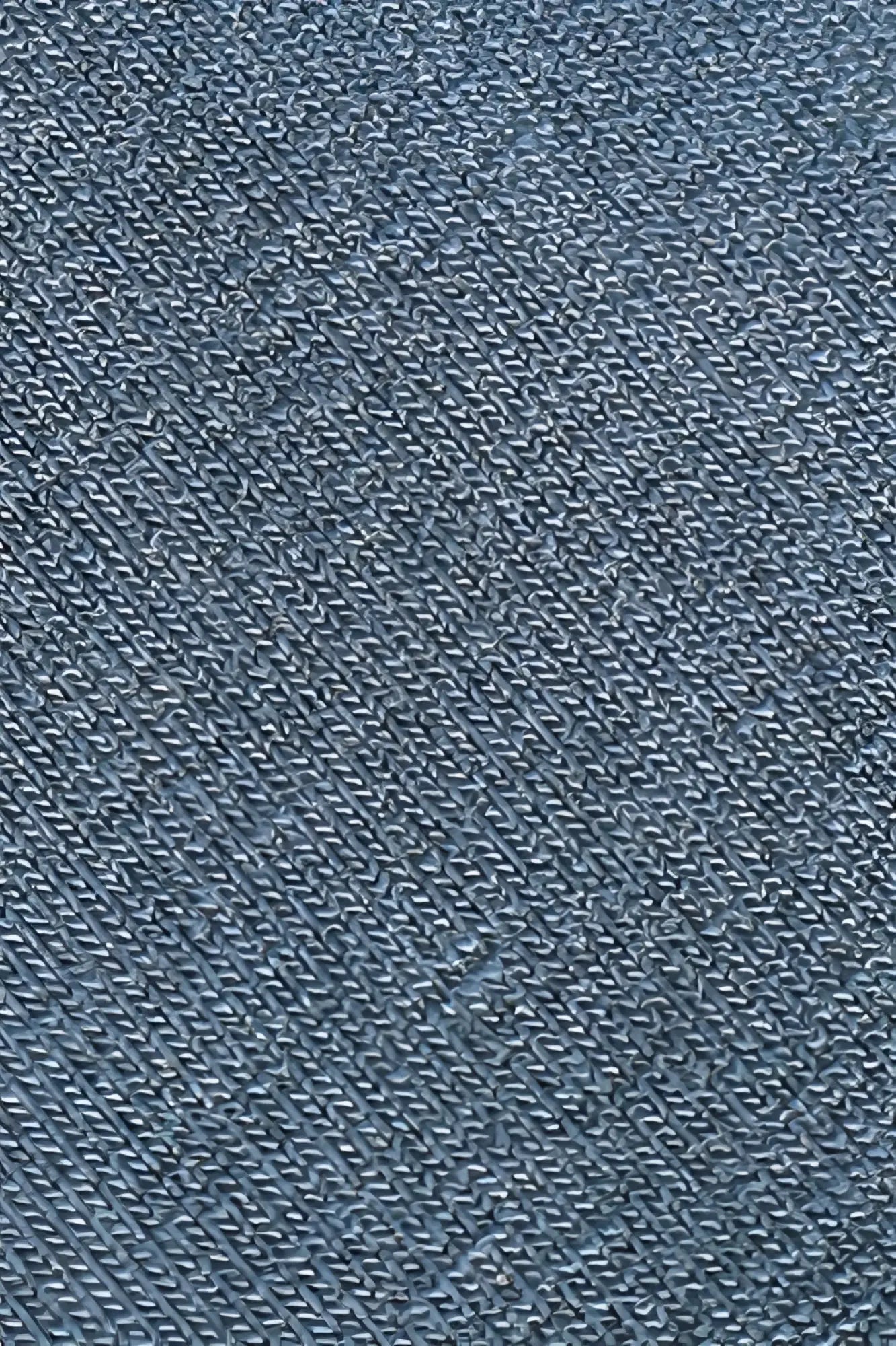 Blue denim fabric with diagonal weave on jed north titan muscle-fit long sleeve t-shirt in steel blue