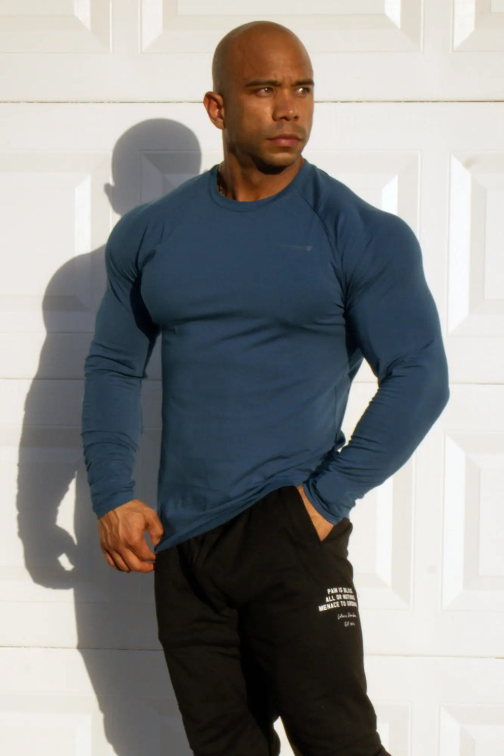 Jed North Titan muscle-fit long sleeve t-shirt in steel blue showing a fitted crew neck athletic shirt design