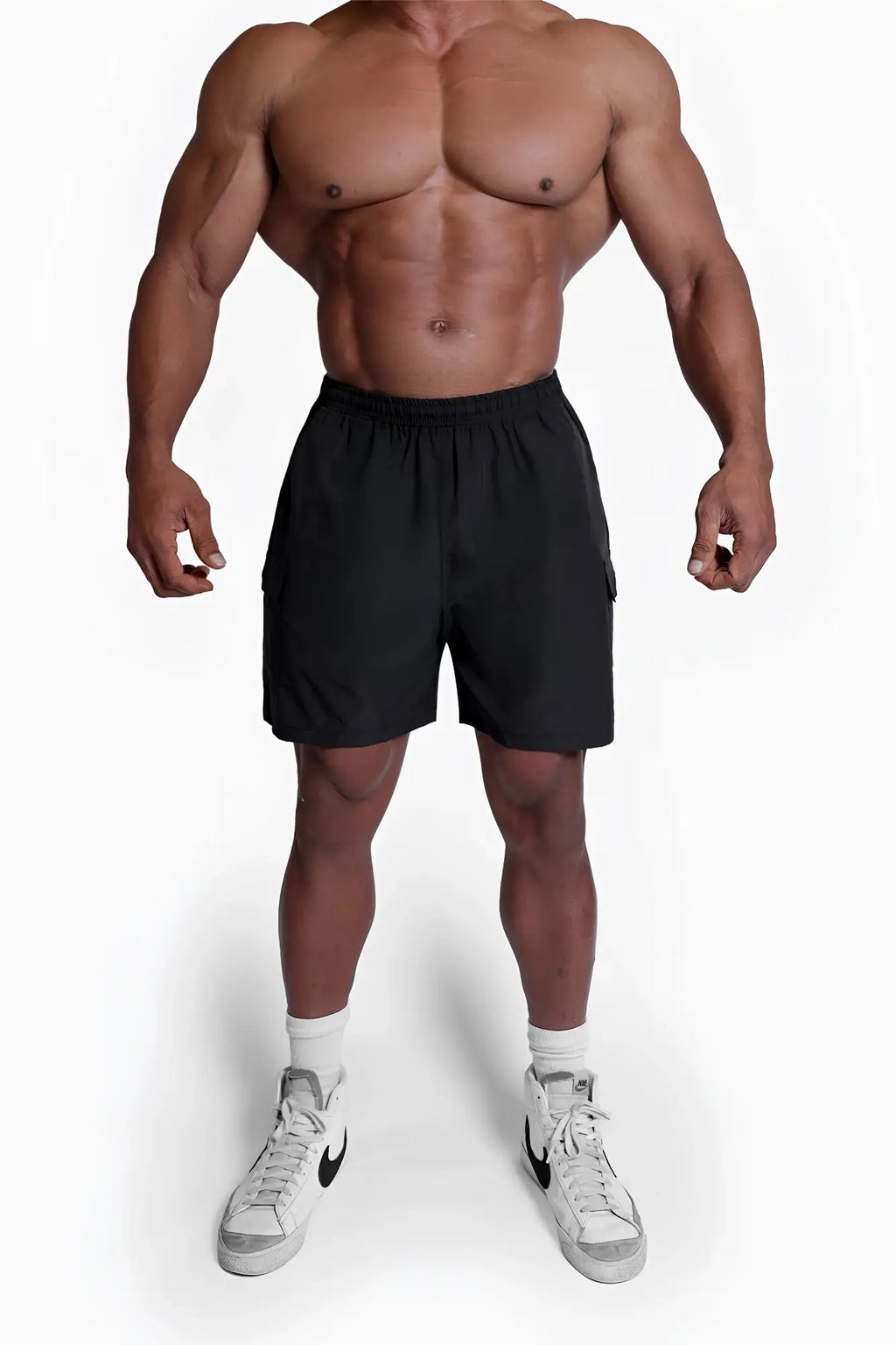 Black trek 4.5 inch cargo shorts with side pockets and elastic waistband designed for athletic use