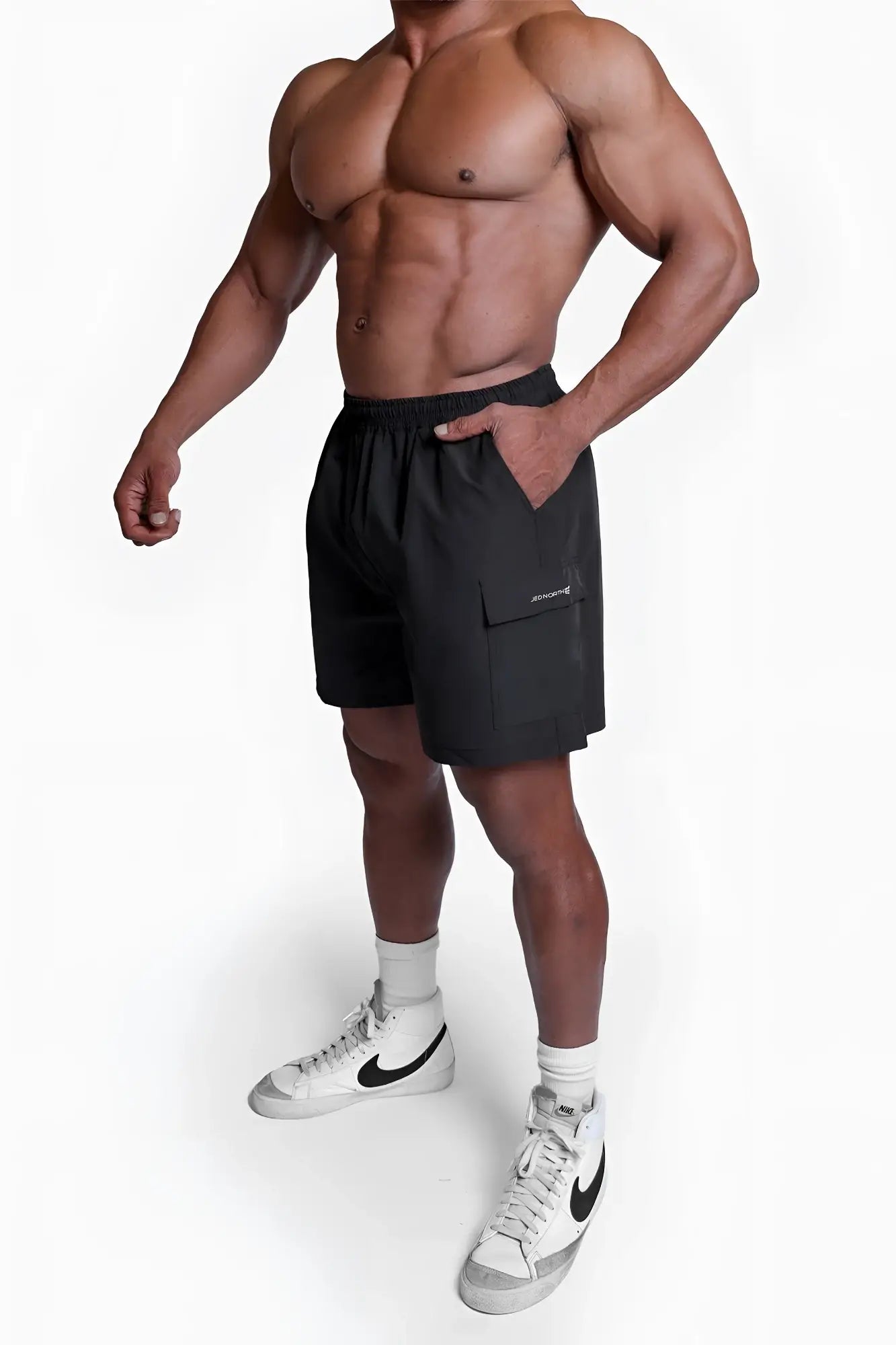 Black trek 4.5 inch cargo shorts with drawstring waistband side pockets and subtle thigh branding