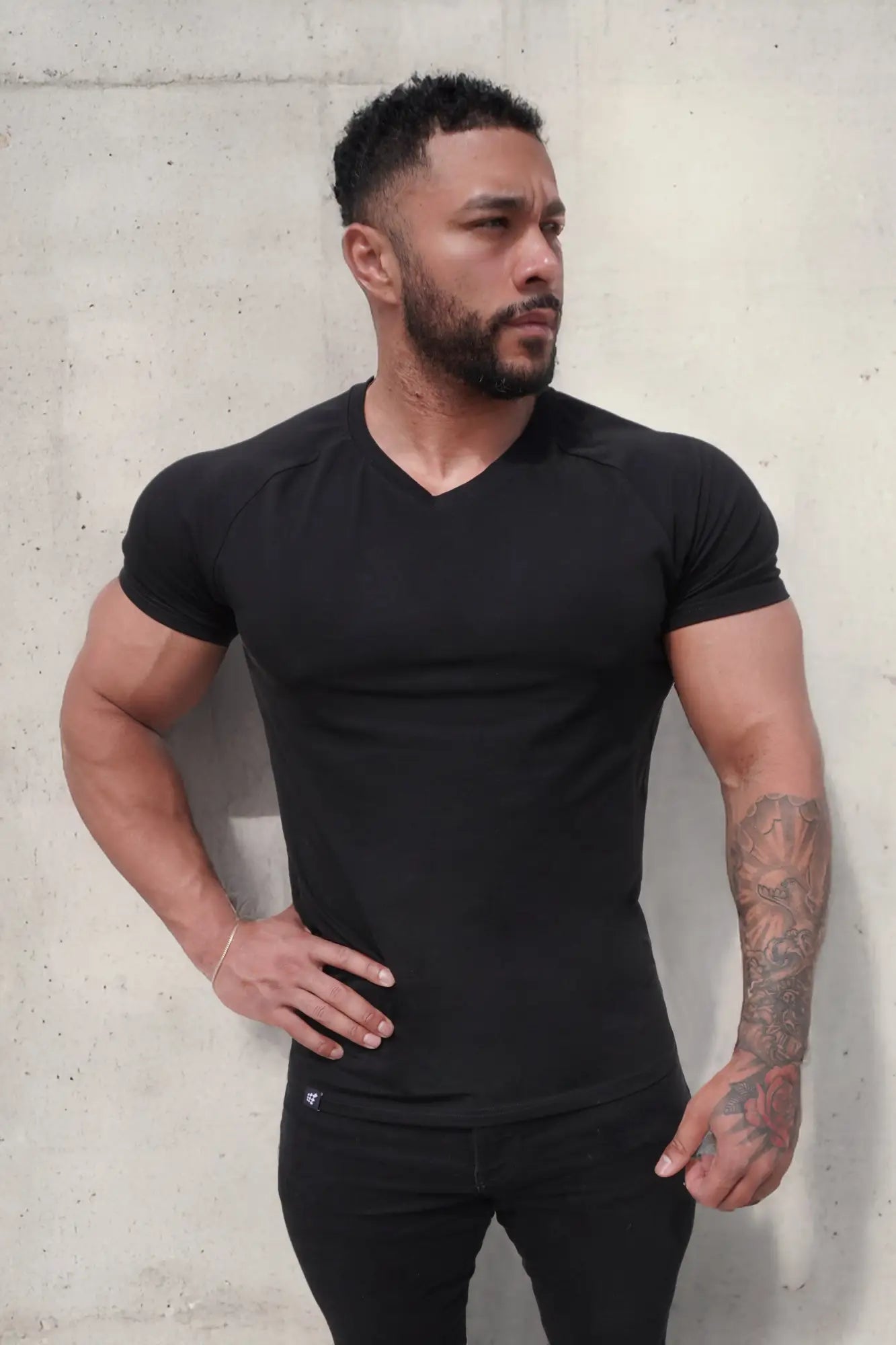 Black jed north v neck muscle fit short sleeve athletic tee made of breathable fabric for workouts