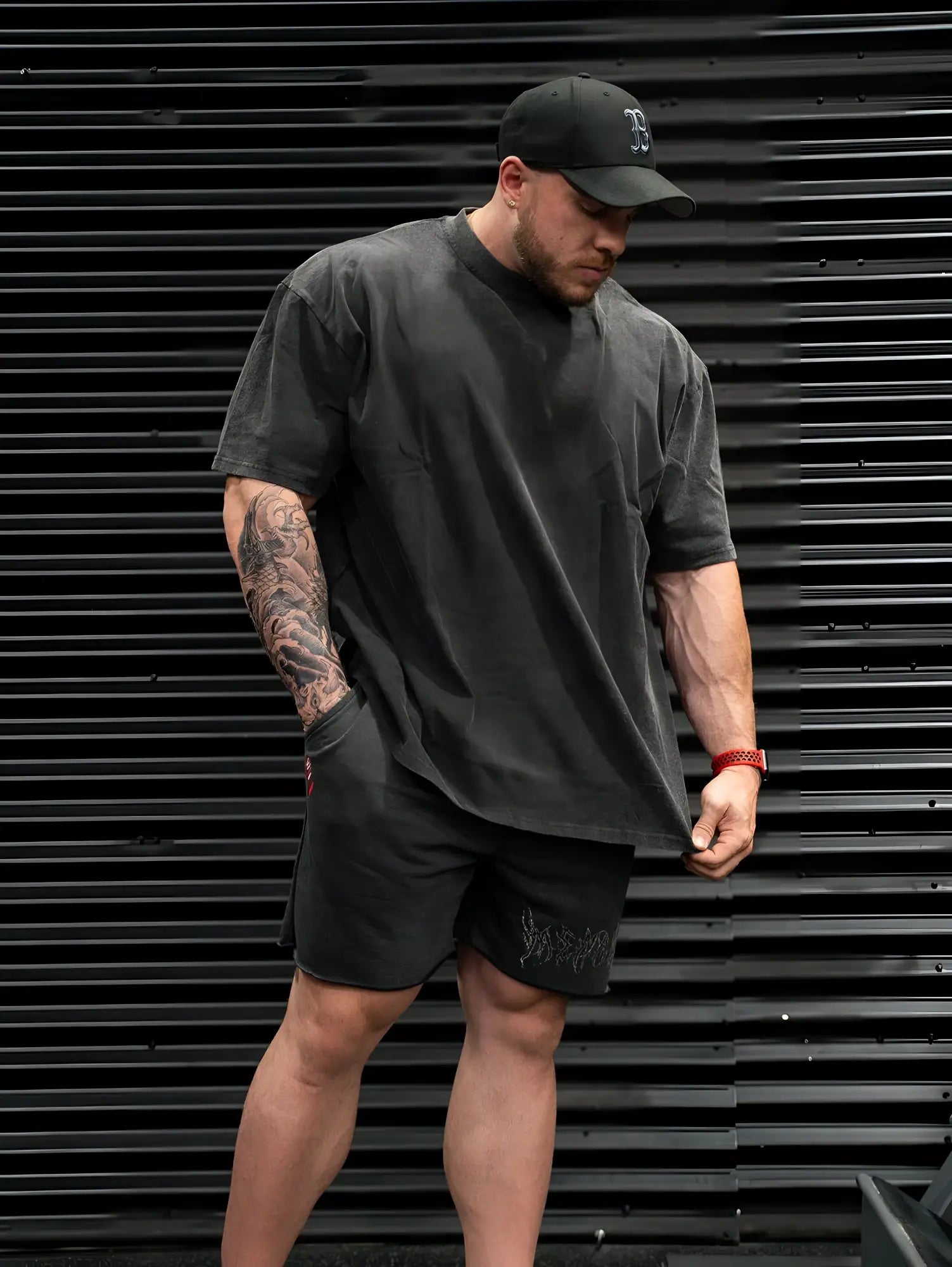 Black baseball cap with white embroidered logo featured with jed north vintage oversized t shirt ring of fire 2.0