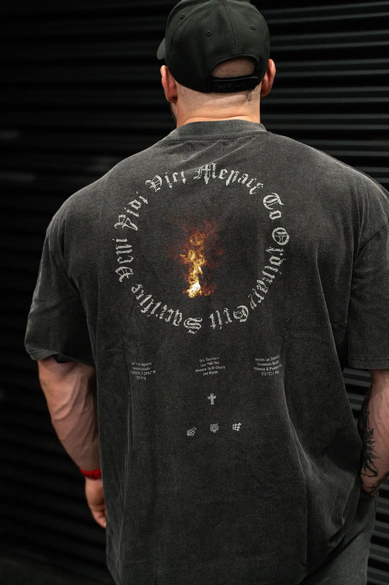 Black distressed cotton t-shirt with orange flame circular graphic and white text from Jed North vintage oversized ring of fire 2.0 collection