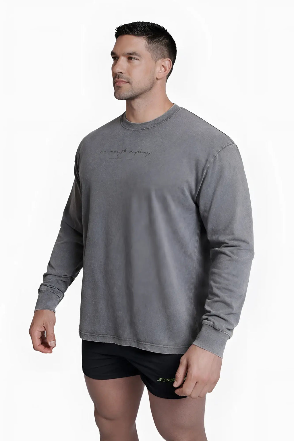 Vintage wash long sleeve t-shirt in storm gray with subtle faded texture and small embroidered chest text