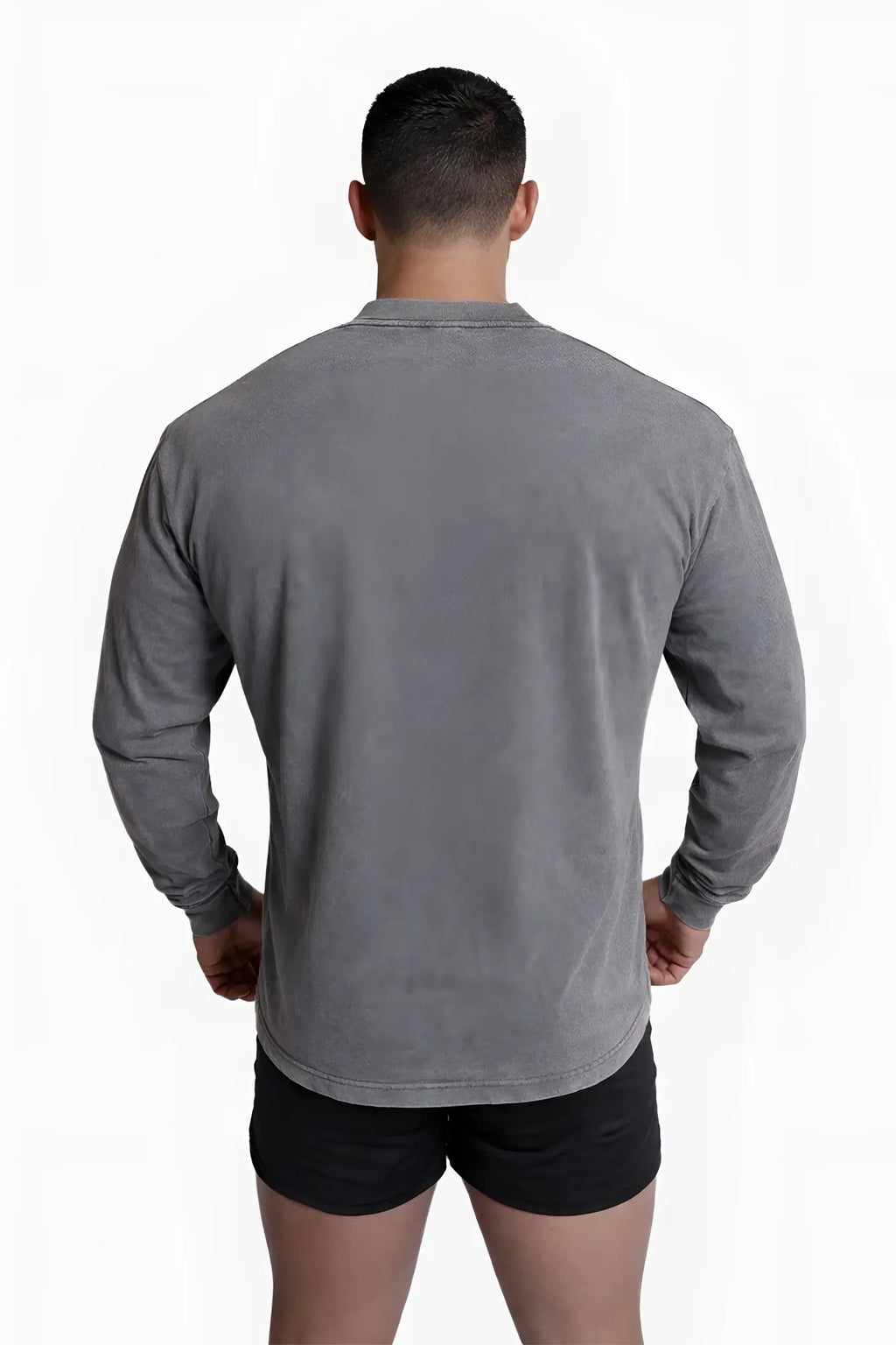 A gray vintage wash long sleeve t-shirt with textured fabric and a classic crew neck design