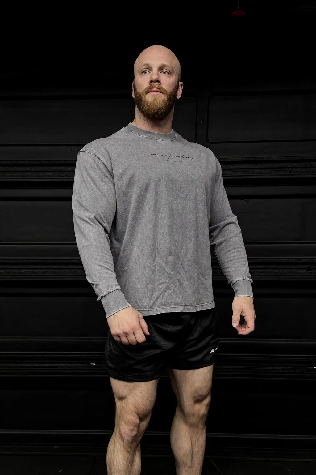 Vintage wash long sleeve t-shirt in storm gray with subtle textured pattern and small embroidered chest logo