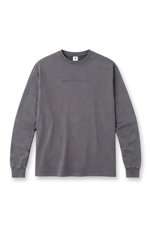 Vintage wash long sleeve storm gray t-shirt with soft muted fabric and subtle embroidered phrase on the chest