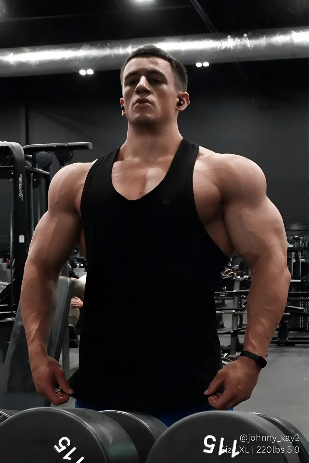 Black sleeveless vital raw-hem tank top 2.0 with v-neckline made from breathable fabric for active wear