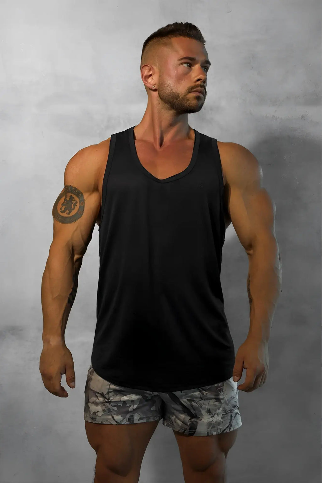 Black sleeveless v-neck vital raw-hem tank top 2.0 made from breathable fabric for active wear