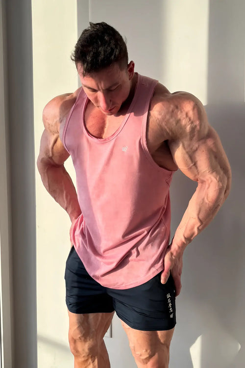 Jed North Vital raw-hem salmon pink tank top with a small white logo on the chest designed for activewear