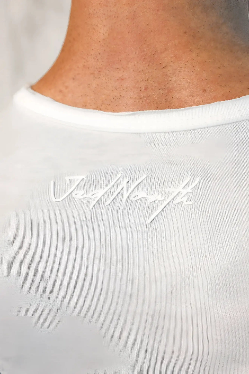 White vital raw-hem tank top 2.0 with subtle jed north crew neck embroidery in matching white thread