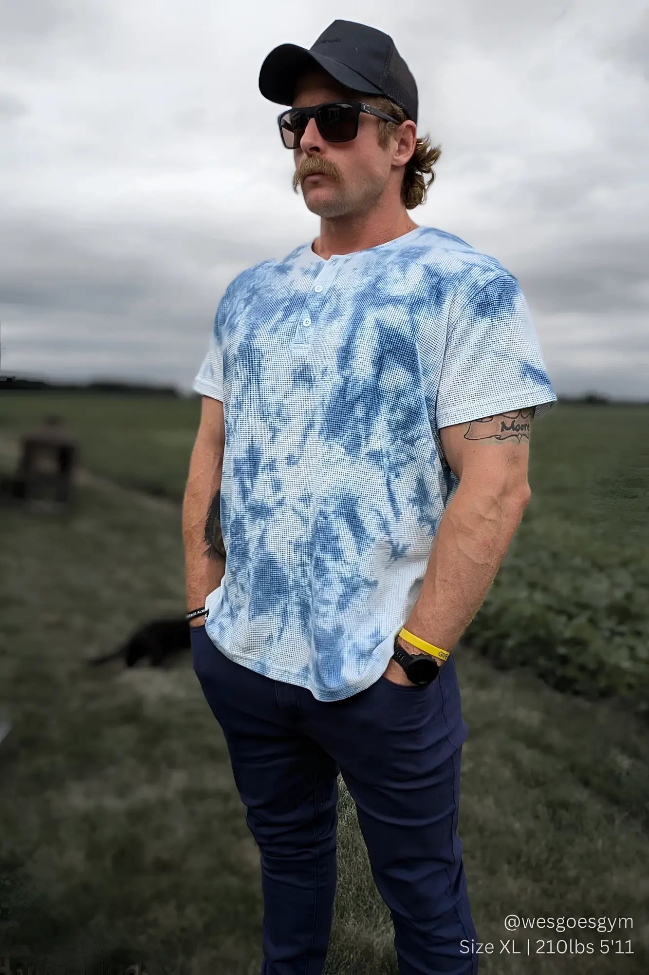 Blue and white tie dye waffle henley t-shirt with short sleeves and textured weave pattern for casual wear