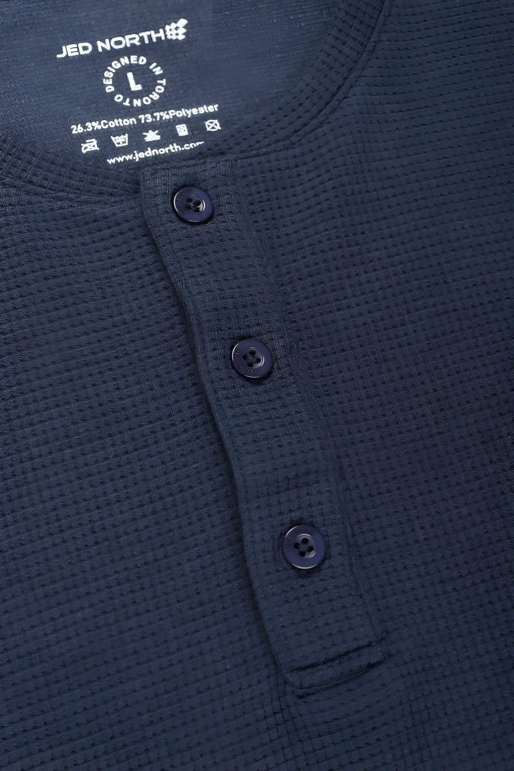 Dark navy blue waffle knit henley shirt with black buttons and jed north label in dusty blue waffle henley t shirt style