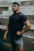 Dark navy blue textured short-sleeved henley shirt featuring waffle knit fabric for casual wear