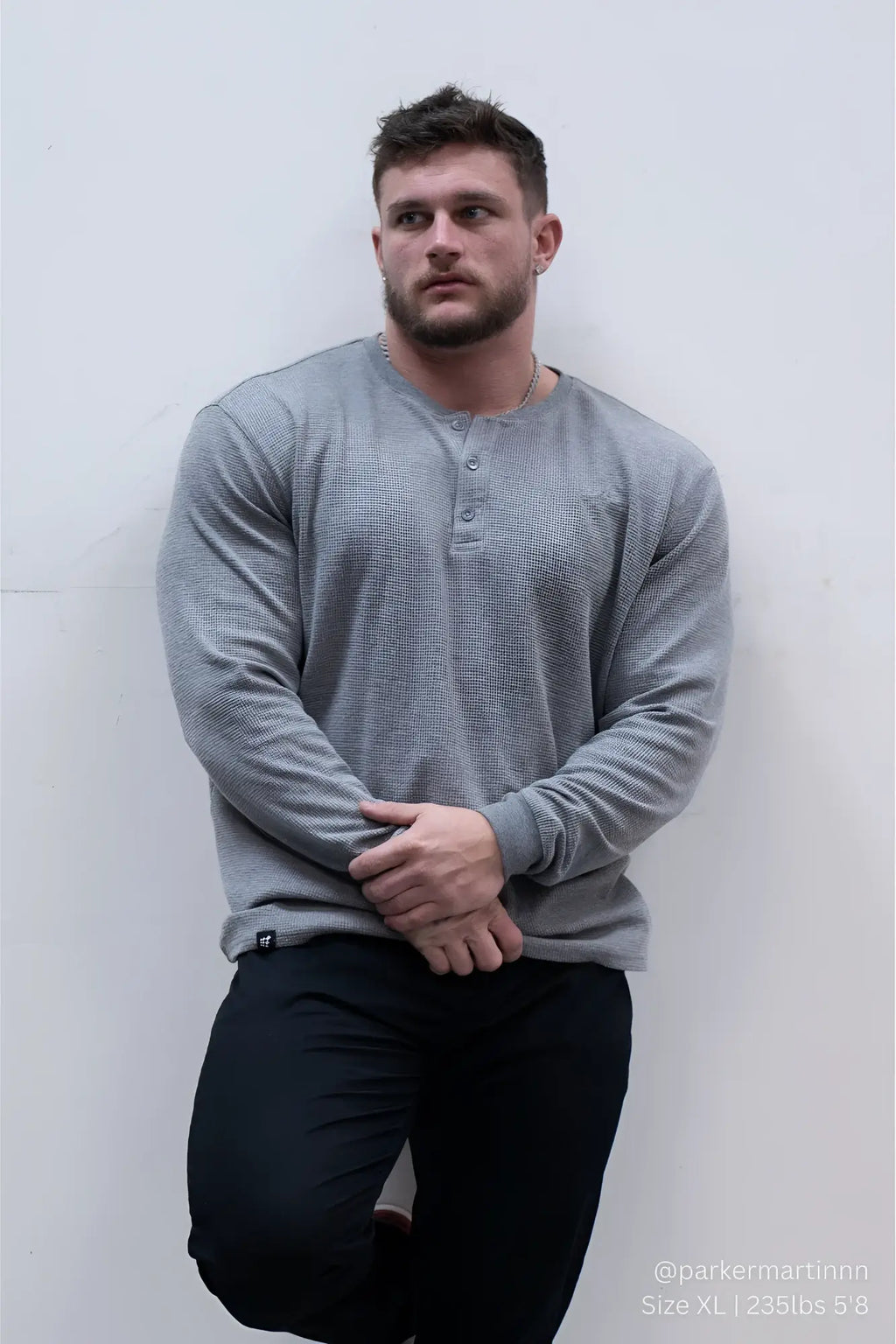 Dark gray waffle knit henley long sleeve t shirt with textured fabric for casual wear