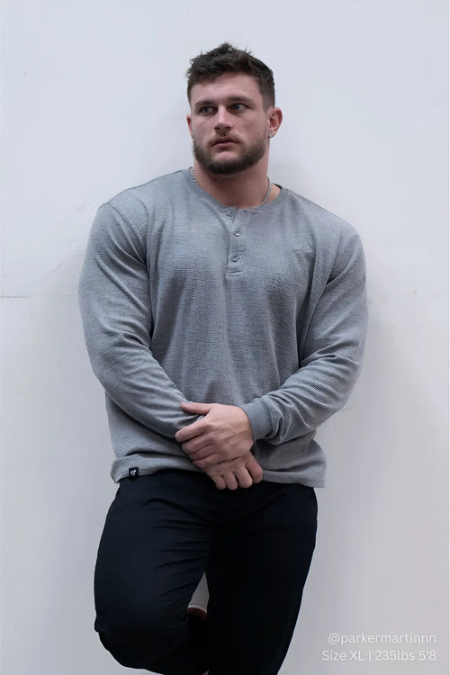 Dark gray waffle knit henley long sleeve t shirt with textured fabric for casual wear