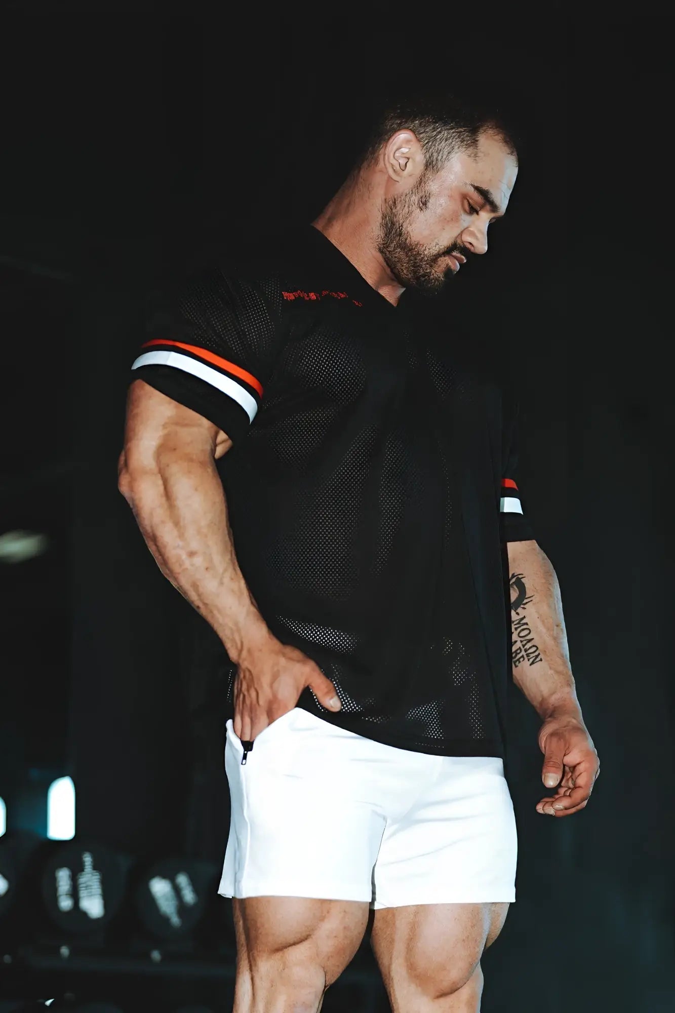 Jed North Warrior V neck jersey black mesh athletic shirt with white and orange striped sleeves for training
