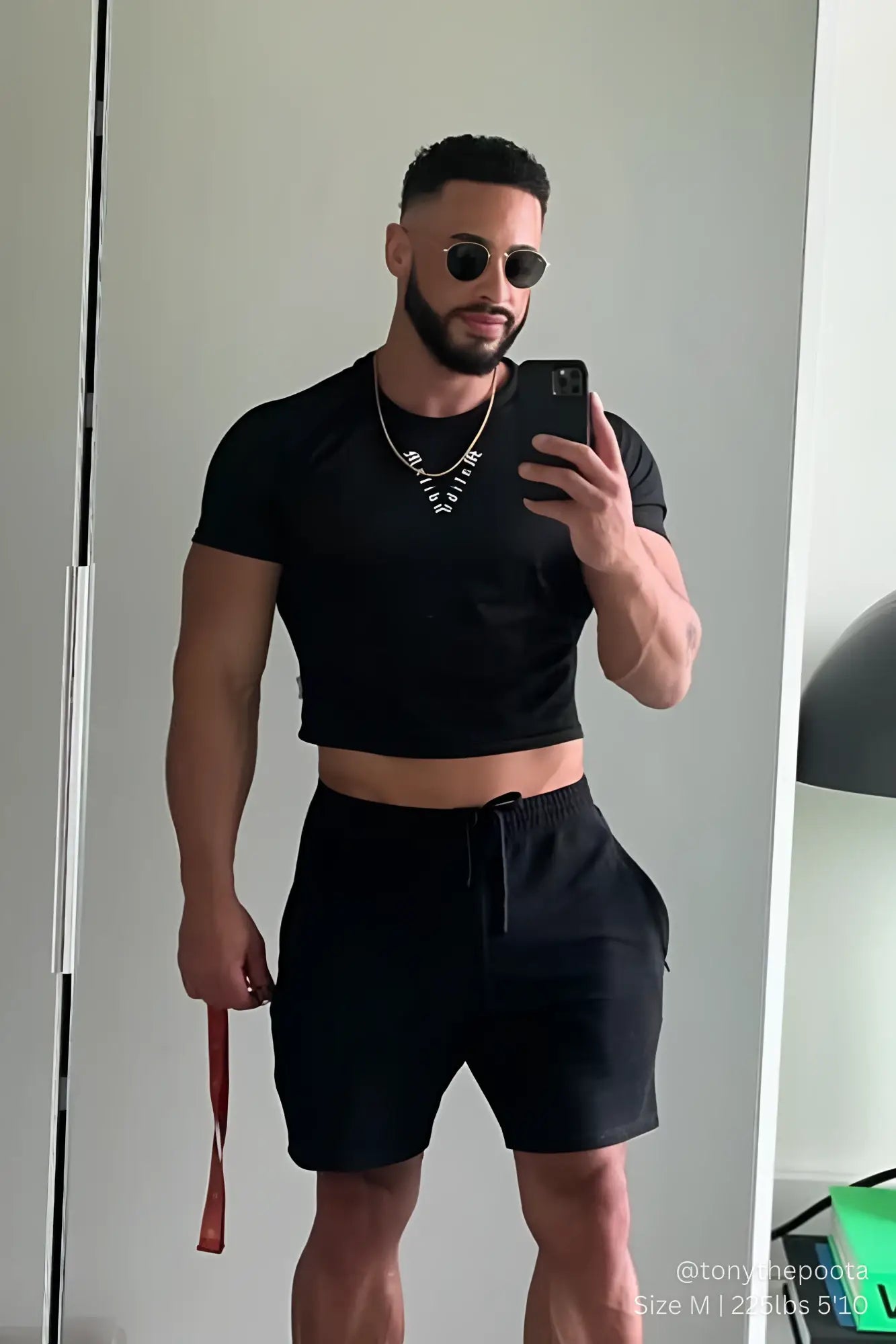 Black cropped jersey mesh t-shirt with short sleeves and ribbed neckline in midnight black color