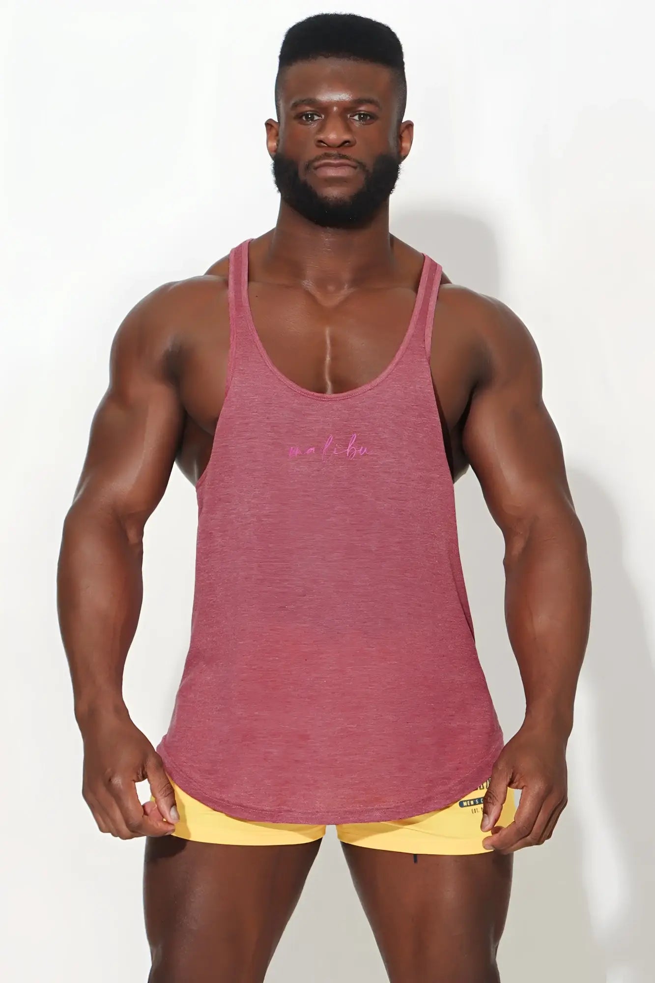 A heathered rose pink jj classic workout stringer muscle tank top with subtle embroidered logo on the chest