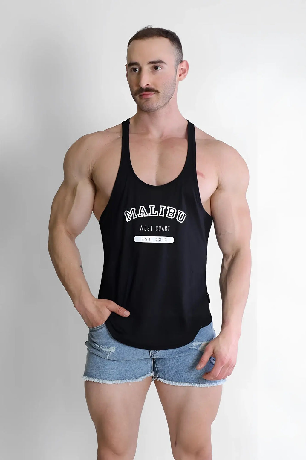 Black malibu west coast tank top with white lettering and a small rectangular tag from jj classic workout stringer collection