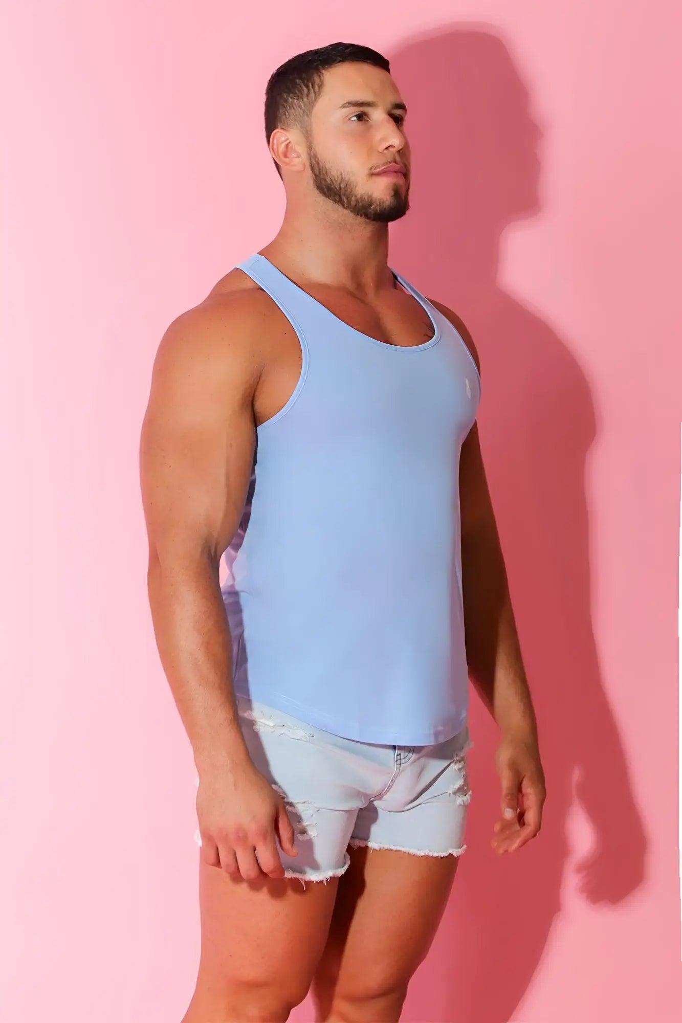 Light blue sleeveless JJ Cool-Dry gym stringer tank top made of breathable fabric ideal for workouts