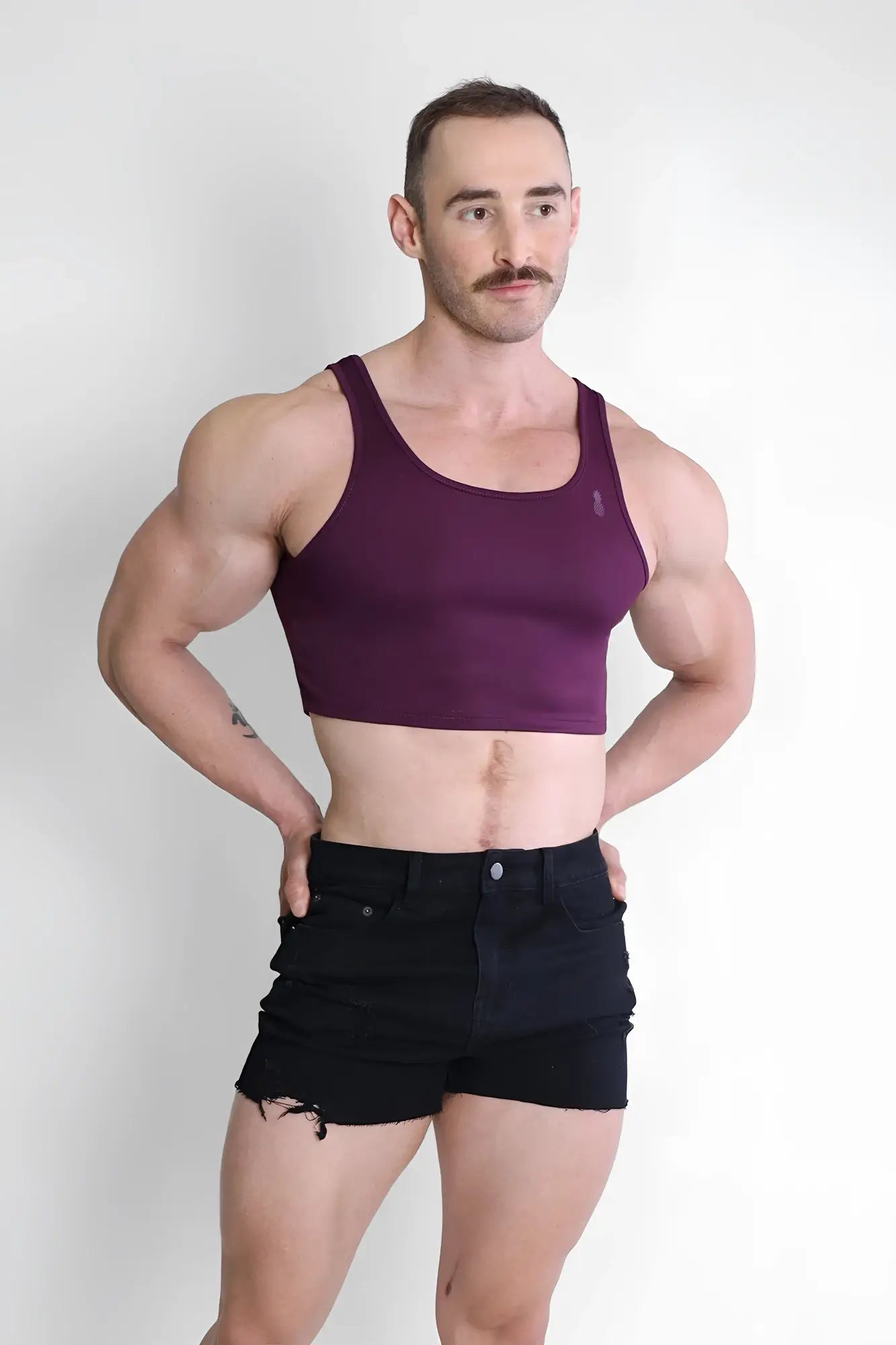 Maroon jj dry-cool crop tank top with a simple fitted design made from moisture-wicking fabric