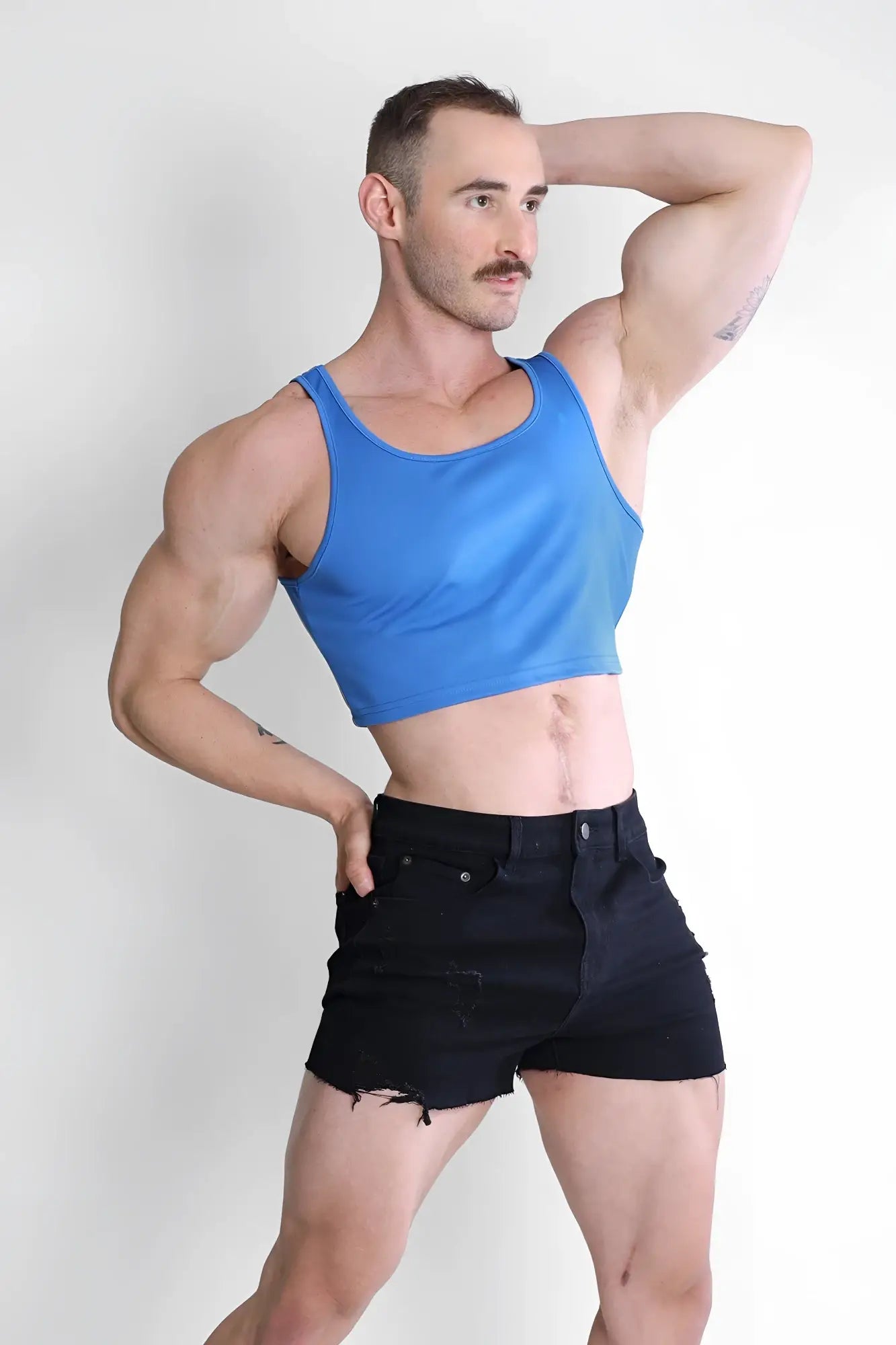Blue jj dry-cool crop tank top made of moisture-wicking fabric for athletic wear
