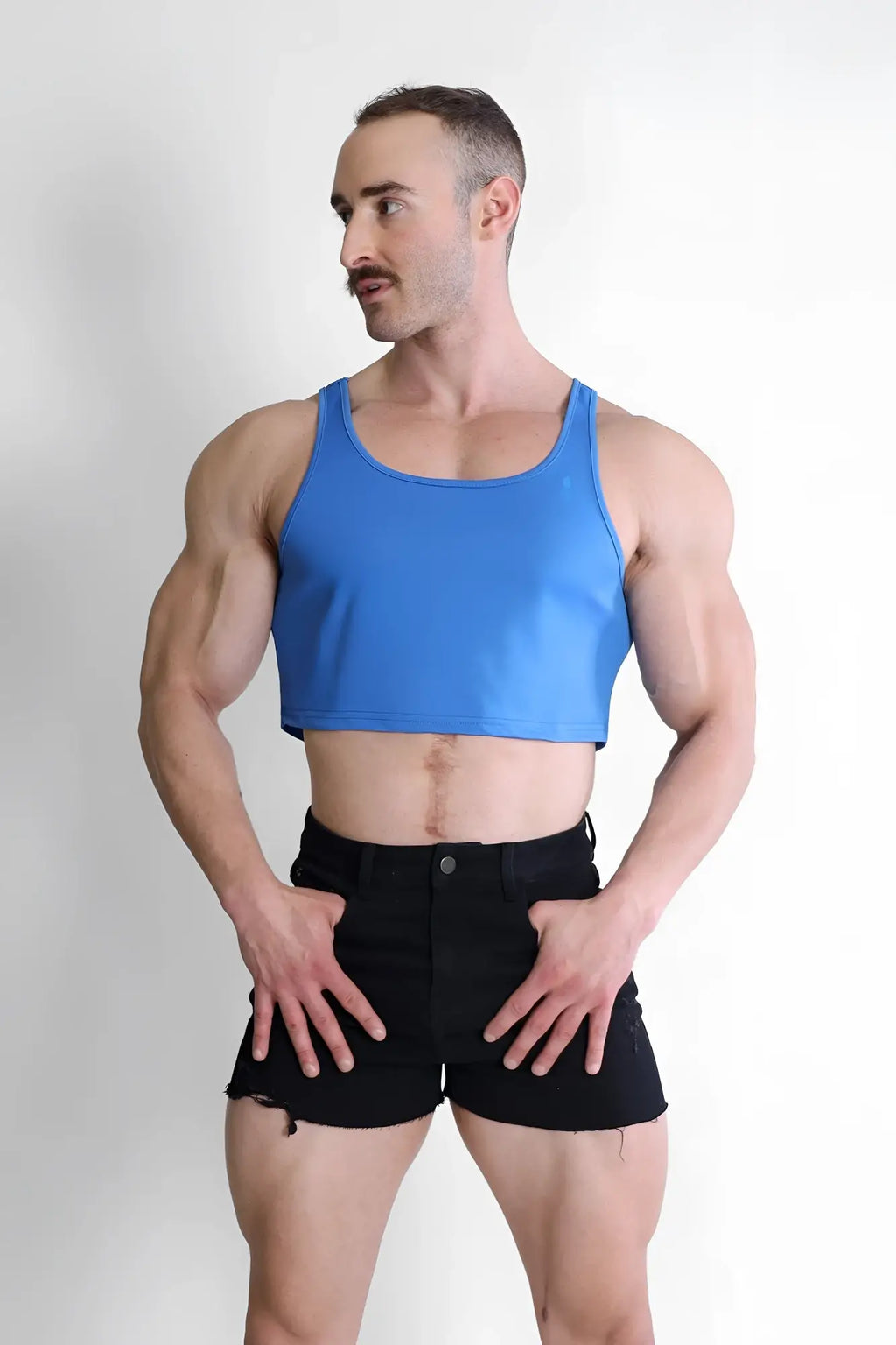 Blue jj dry-cool crop tank top featuring breathable fabric for active wear in royal blue color