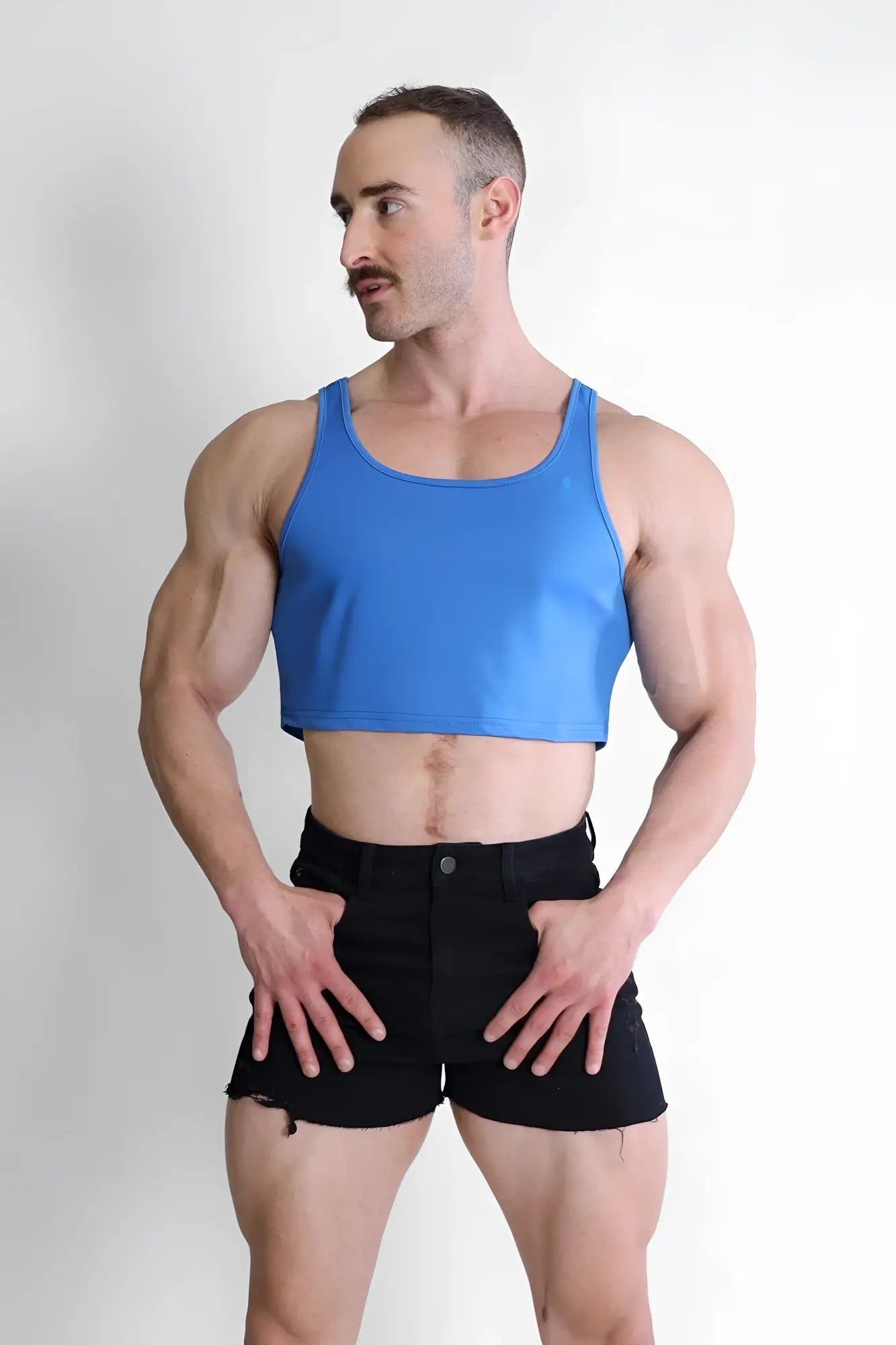 Blue jj dry-cool crop tank top featuring breathable fabric for active wear in royal blue color