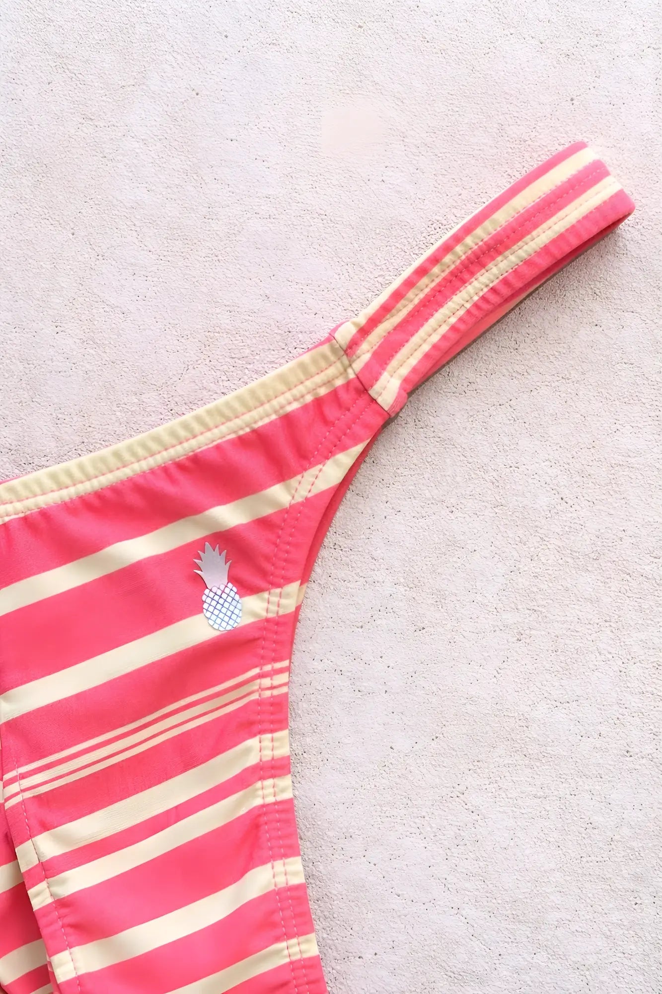 Cheeky classic g-string thong sunset blvd pink and cream striped bikini bottom with embroidered pineapple detail back view