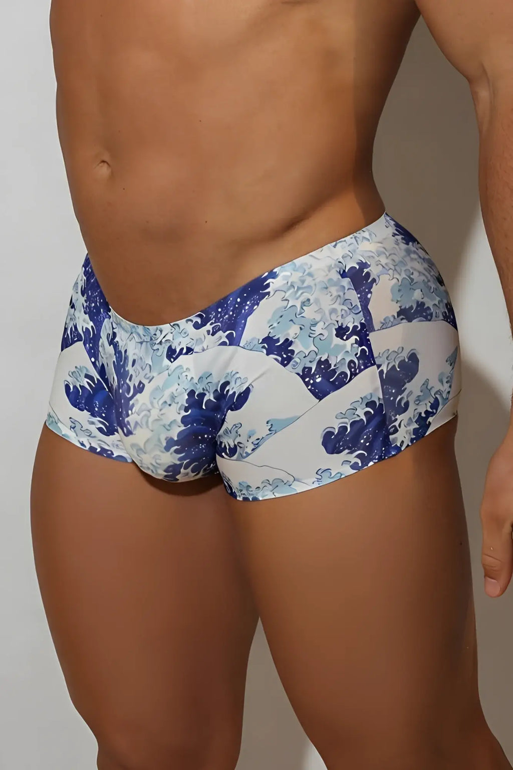 Blue and white silky seamless boxer briefs with bold artistic wave pattern inspired by hokusai the great wave