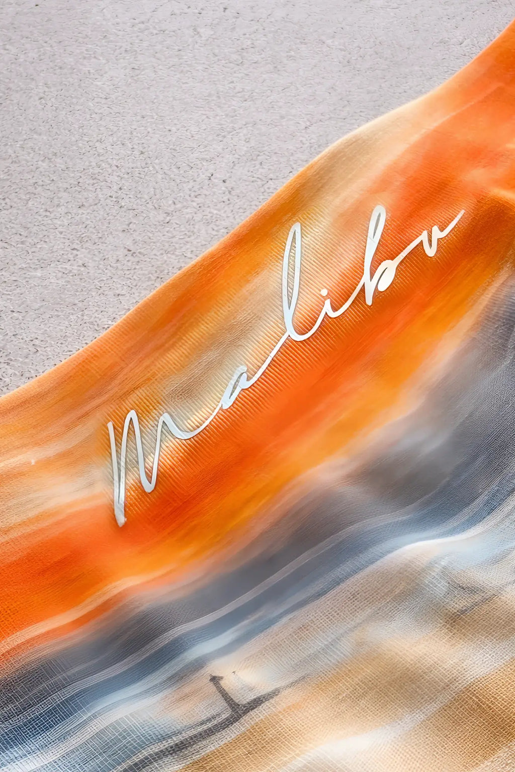 Come-over silky seamless boxer briefs in vibrant orange and blue gradient with silver malibu logo design
